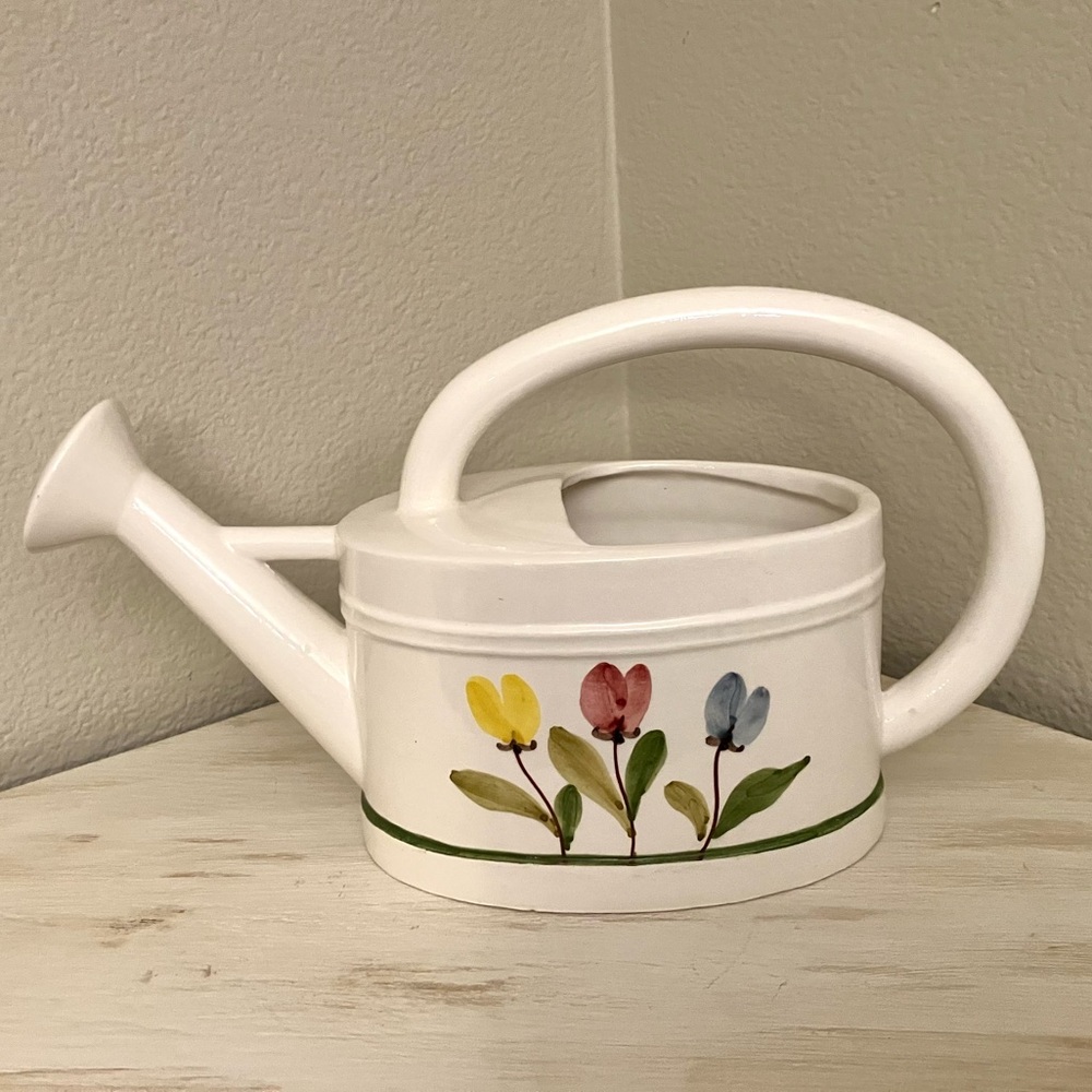 Ceramic watering can with floral design